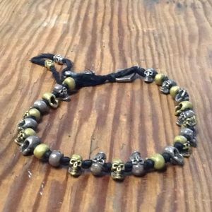 M.Cohen silver and brass skull on silk bracelet